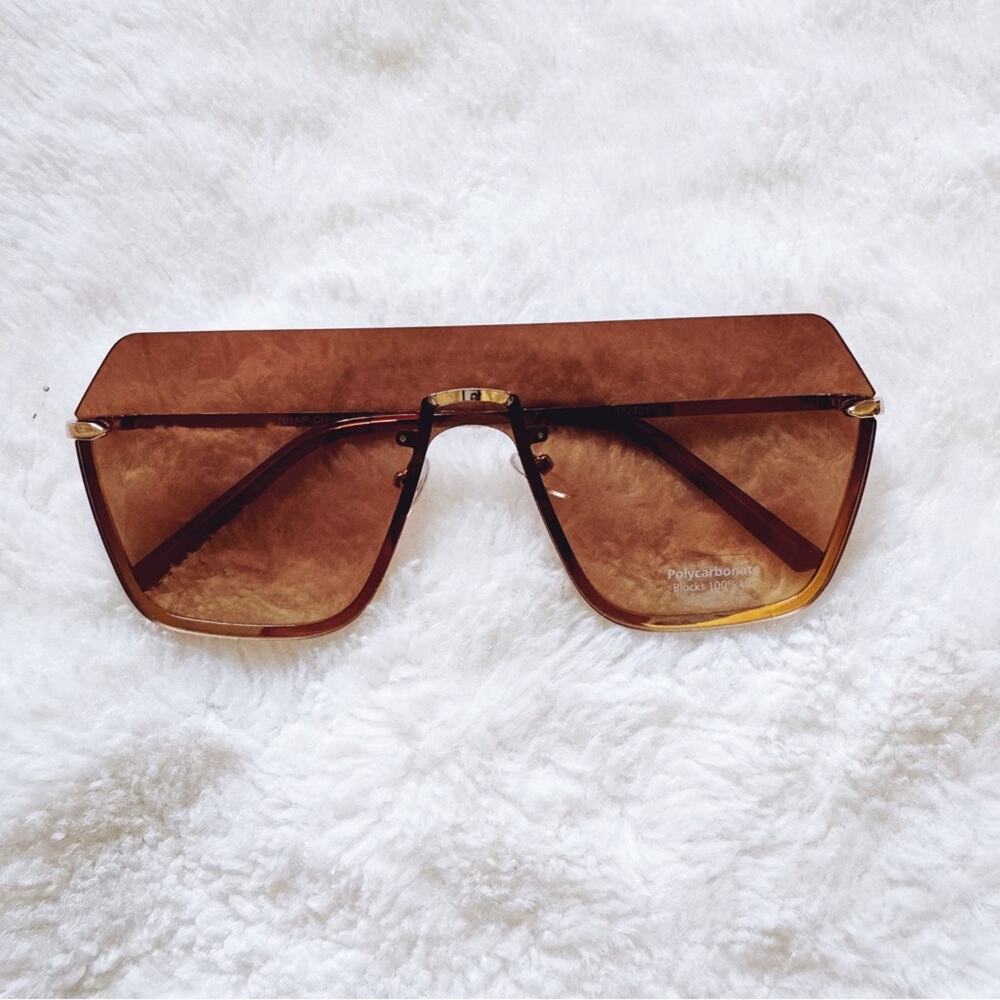 Kalia Clear Brown Rimless Sleek Sunglasses